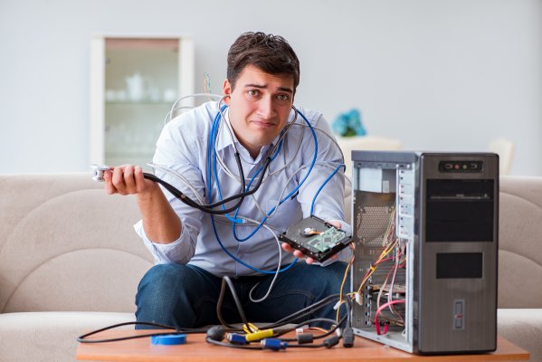 Sad guy with a broken computer