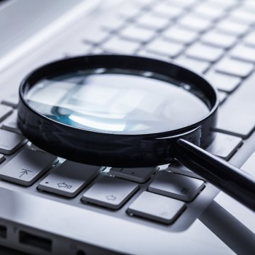 Magnifying glass on keyboard