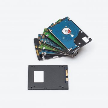 Stack of hard drives on a desk