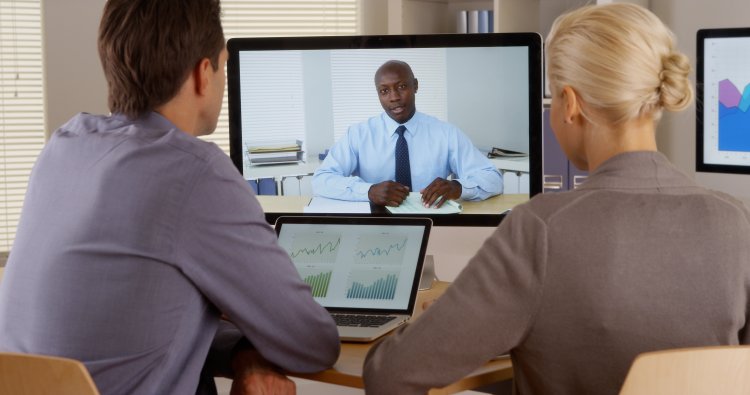 video call man woman on computer monitor voip online