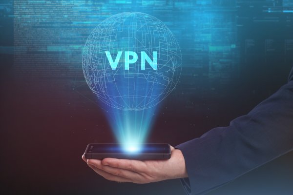 hand holding smartphone vpn earth globe cyberghost vpn service