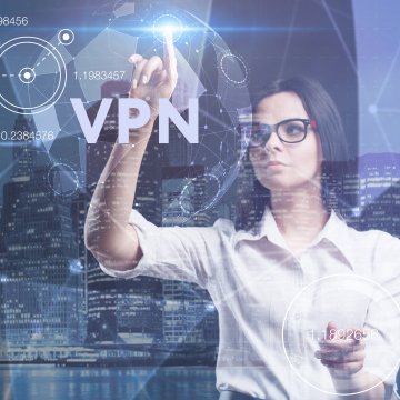 vpn services nordvpn purevpn comparison woman with glasses touching display 