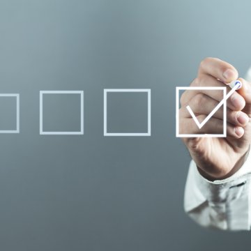 intelius background check man checking box