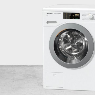 Miele WDB020 washing machine features white front-load washing machine