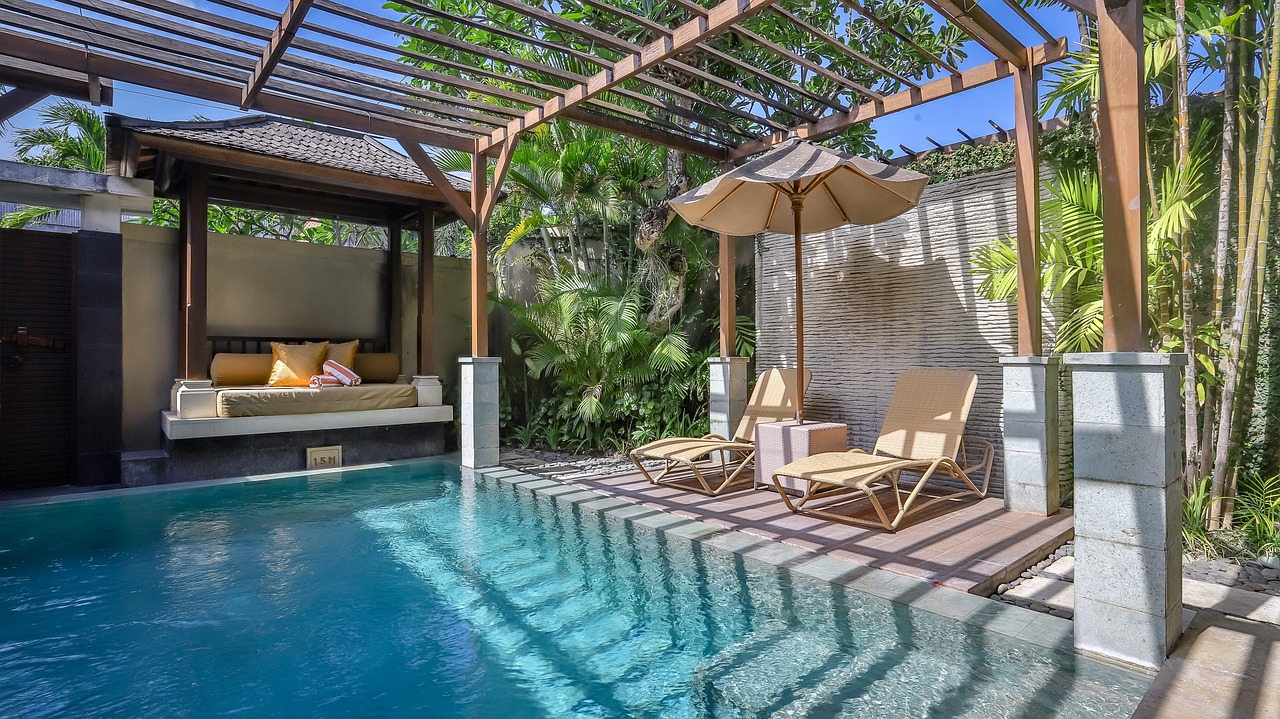 rectangle pool behind a house