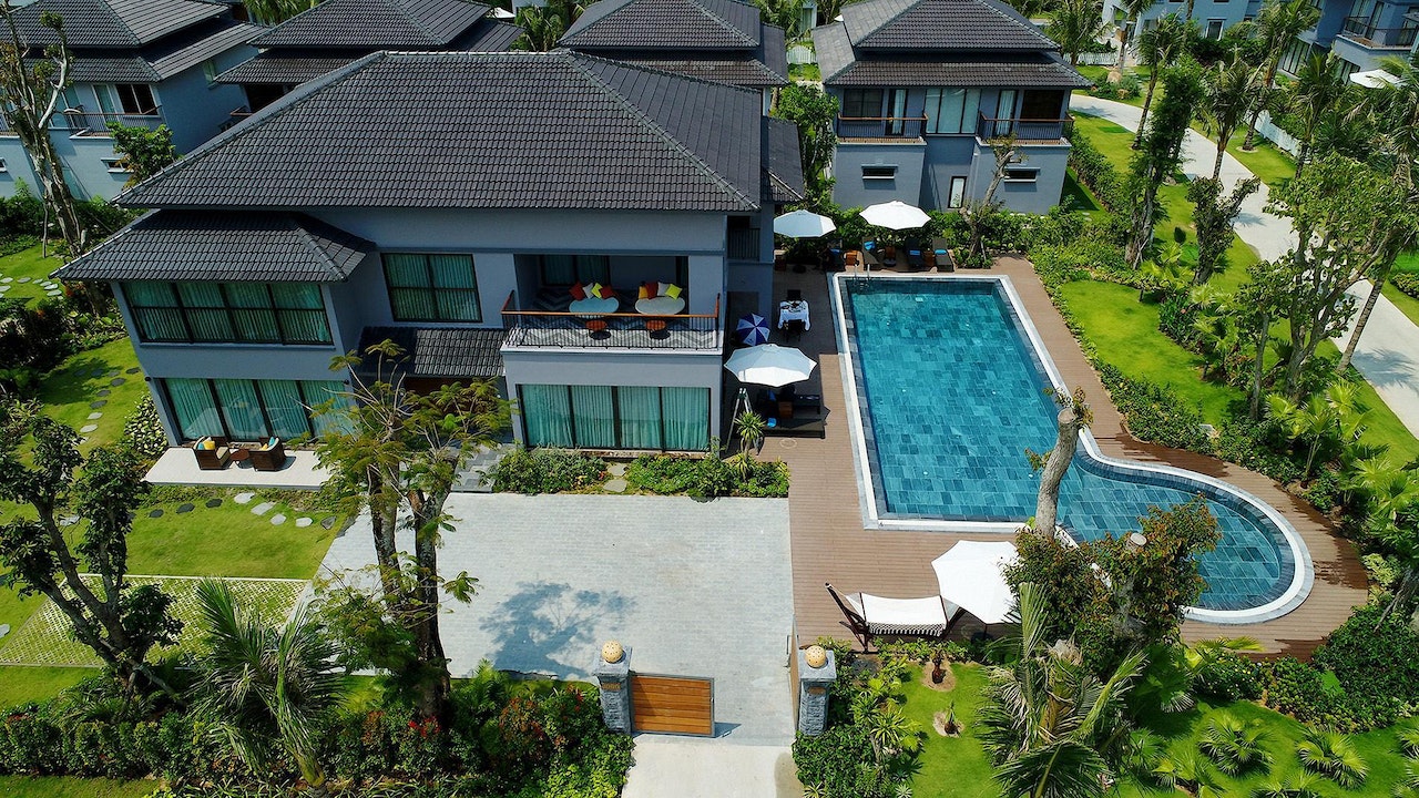 large house with a nice pool on the side