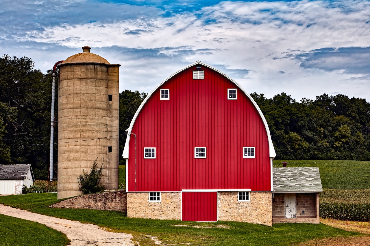 red cabin in an open field