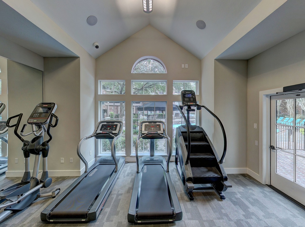 treadmills and stair climbers in a home gym