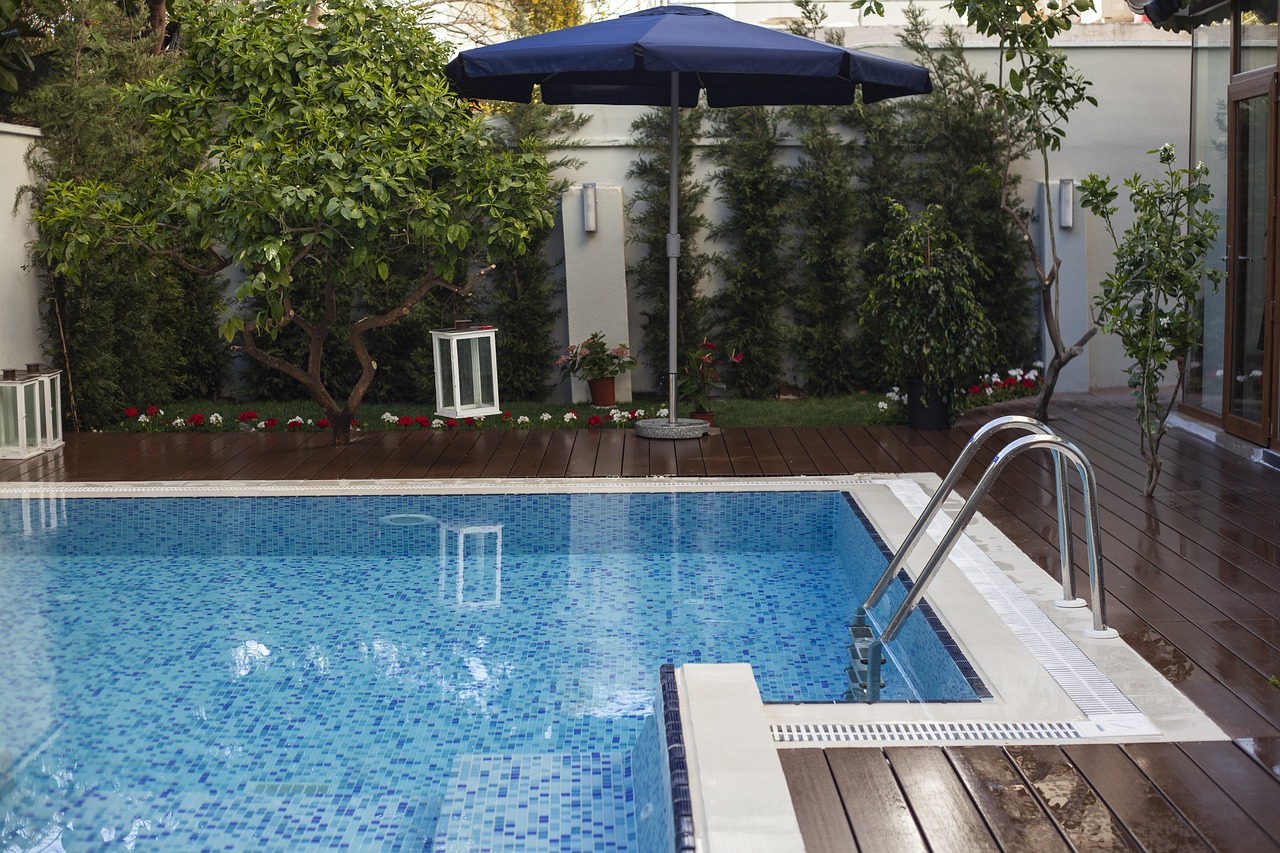 a pool with a nice umbrella setup