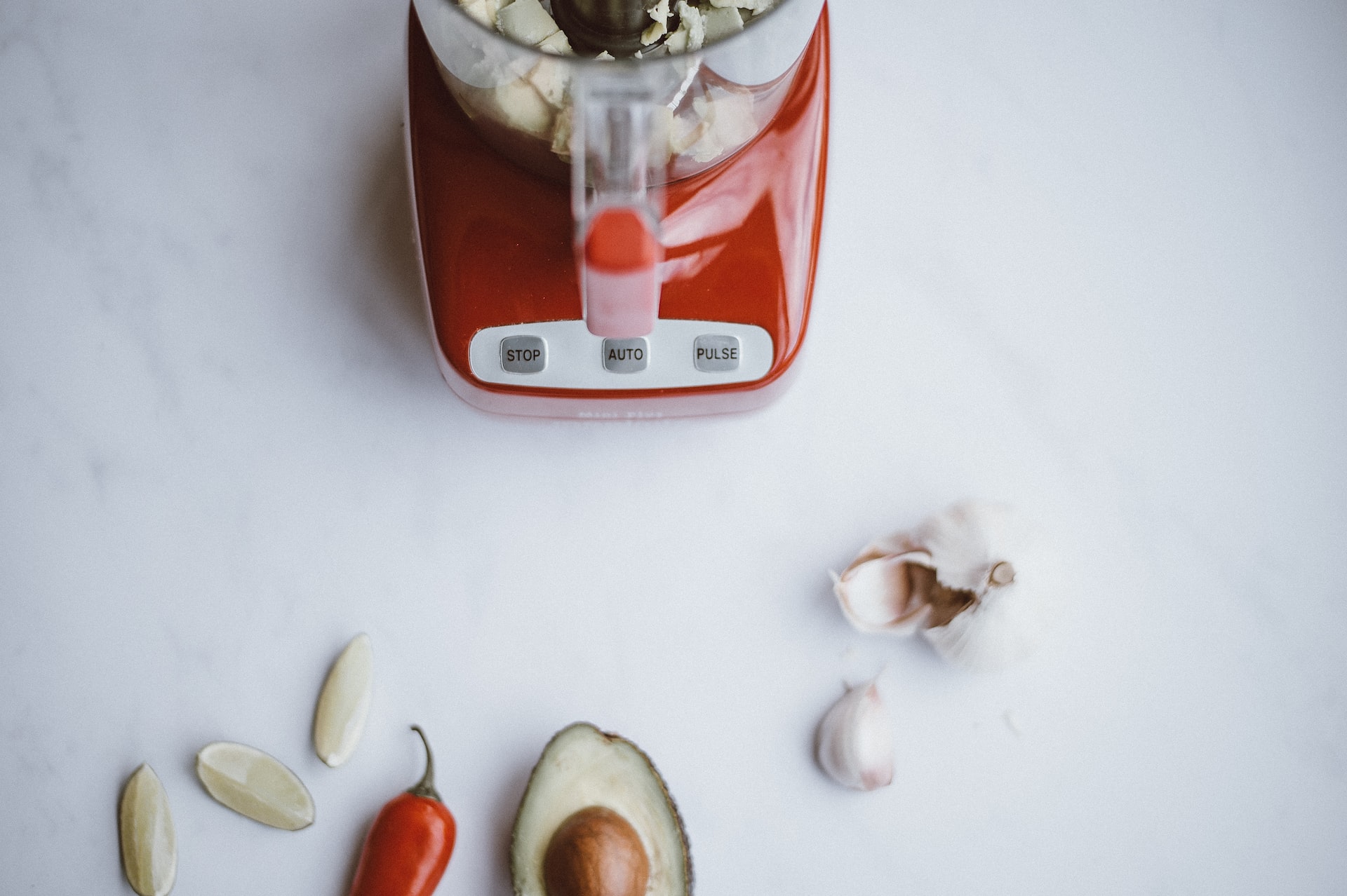 a food processor on a white counter top