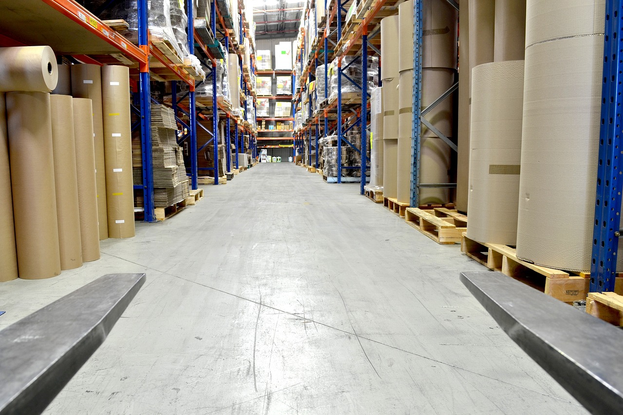 forklift driving in a warehouse