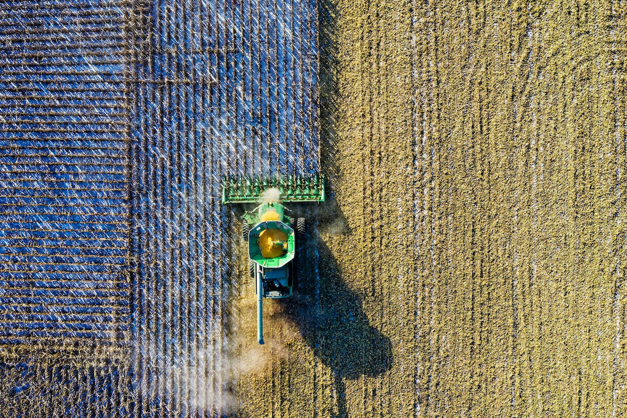 getting a crop ready for sale by harvesting the field