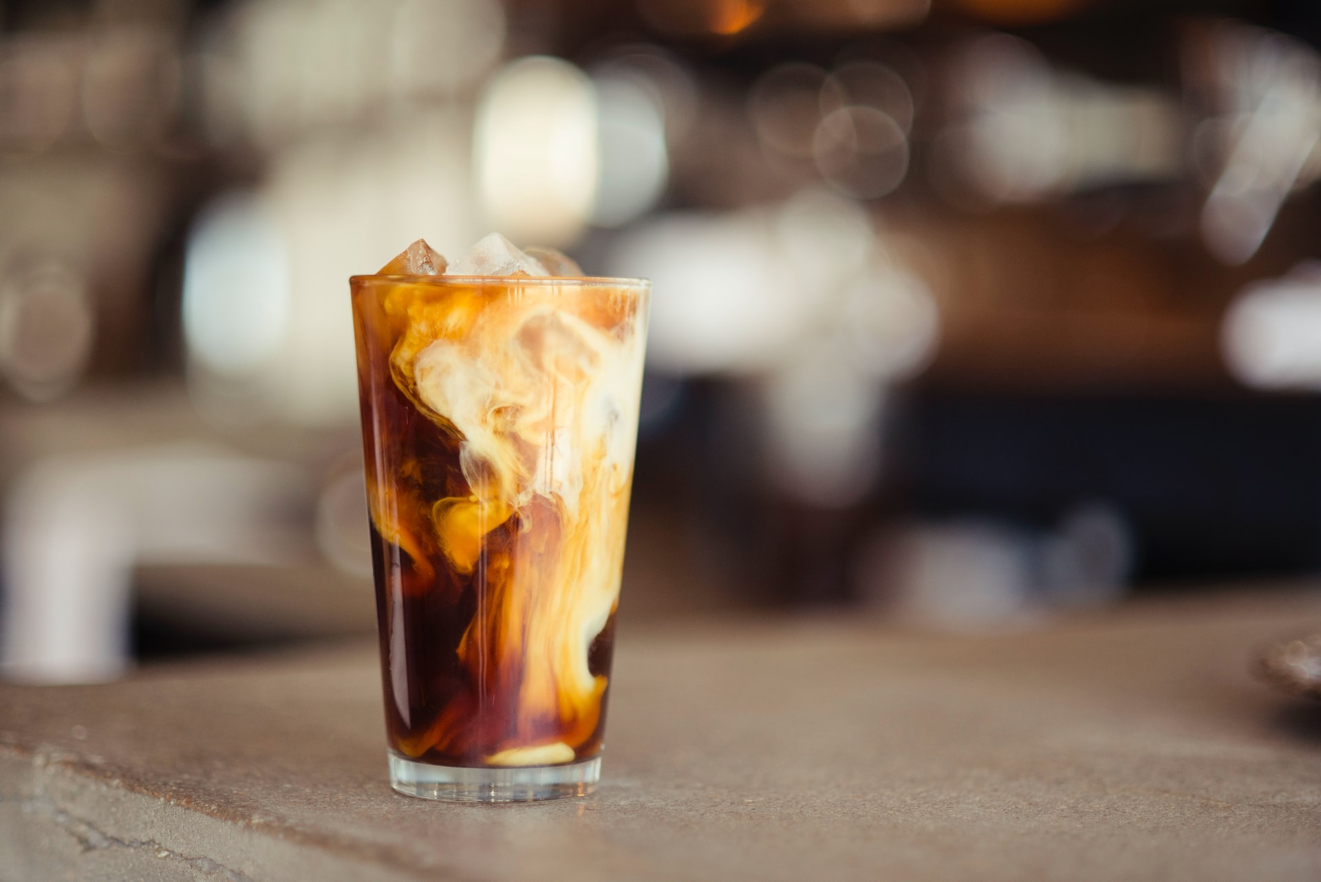 iced coffee in a tall glass cup