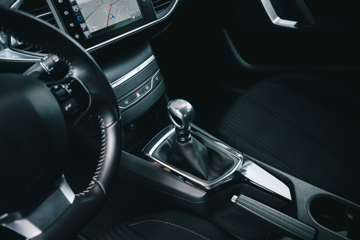 a close up view of a black car interior