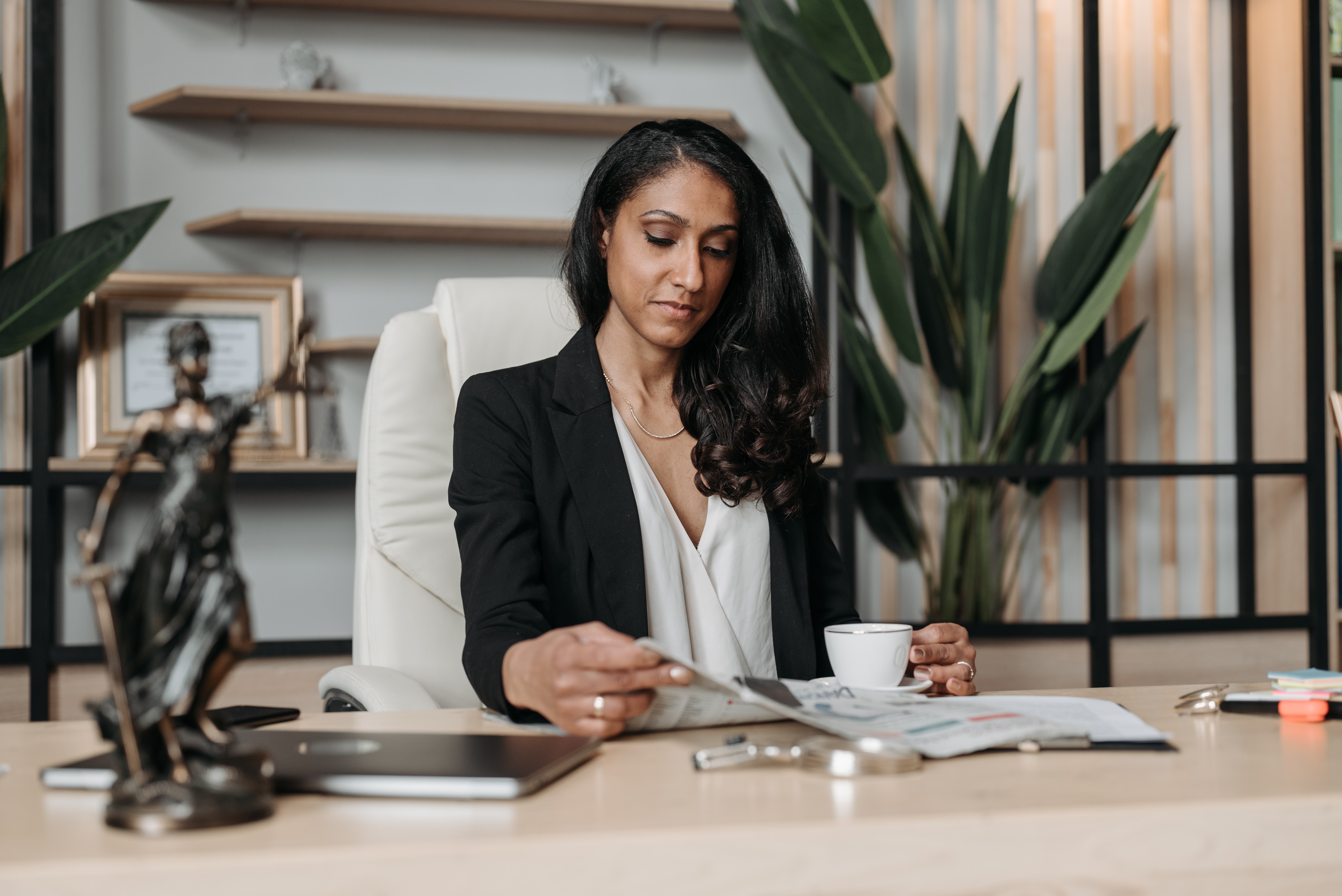 a lawyer looking a paperwork at their desk