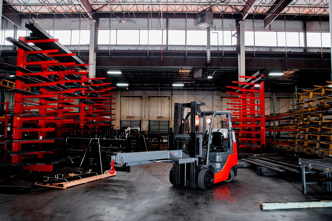 red and black forklift in a wharehouse