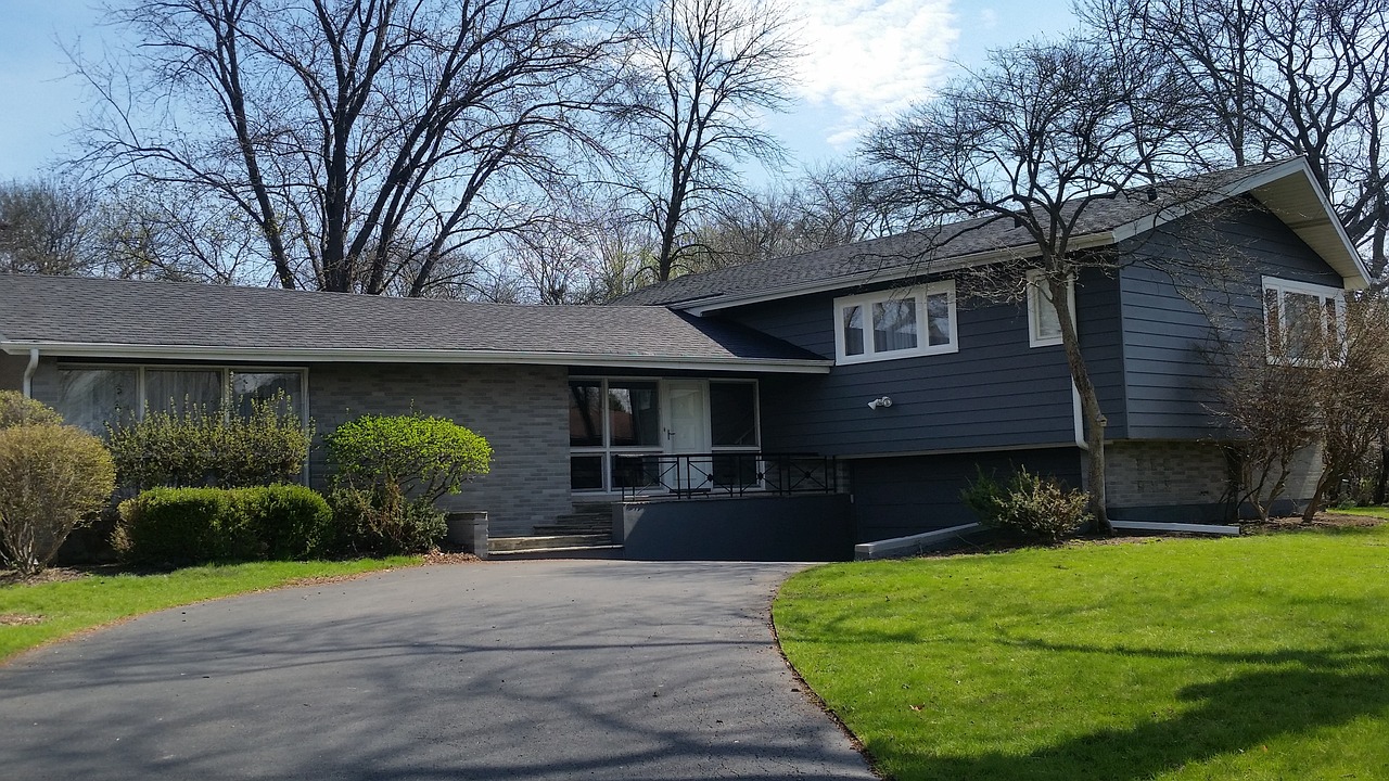 nice looking house with green lawn