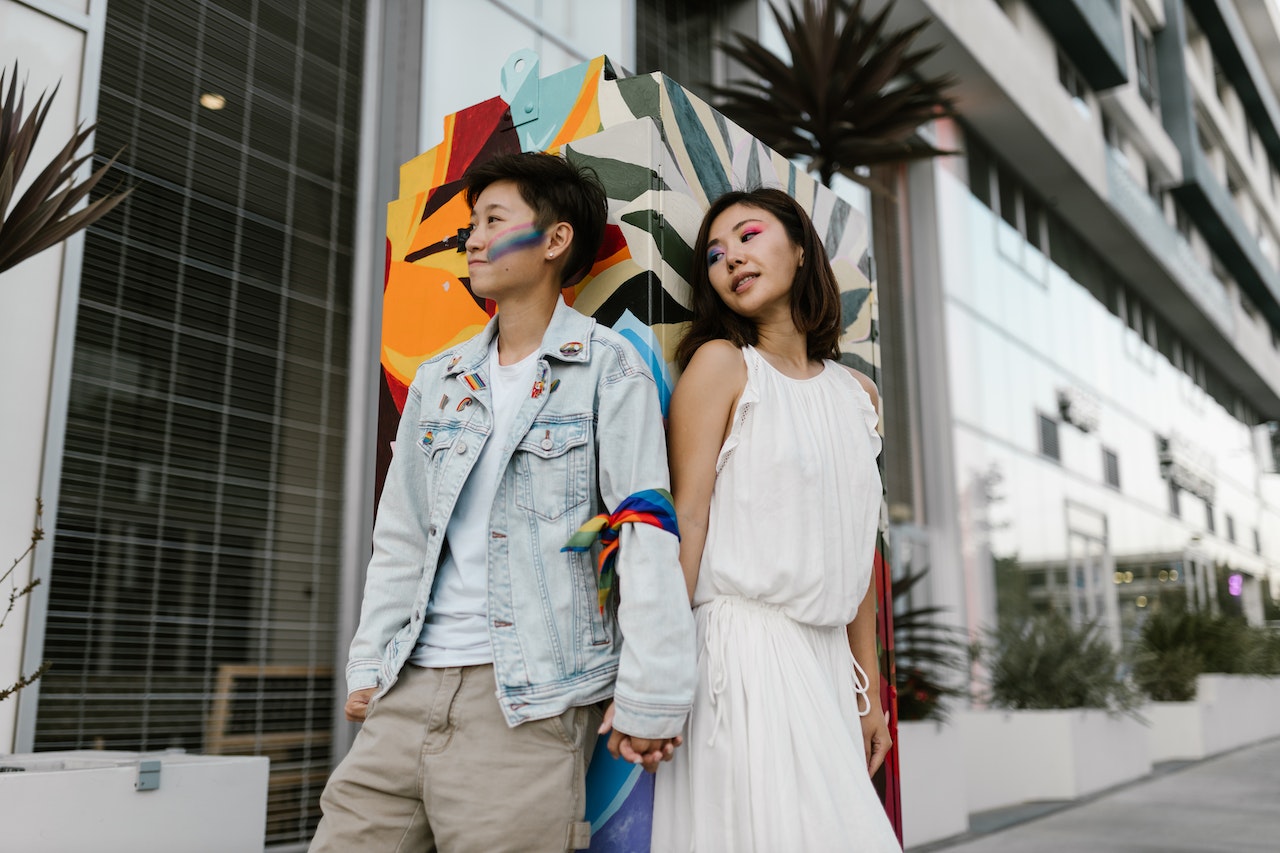 people with enamel pins on standing on the street