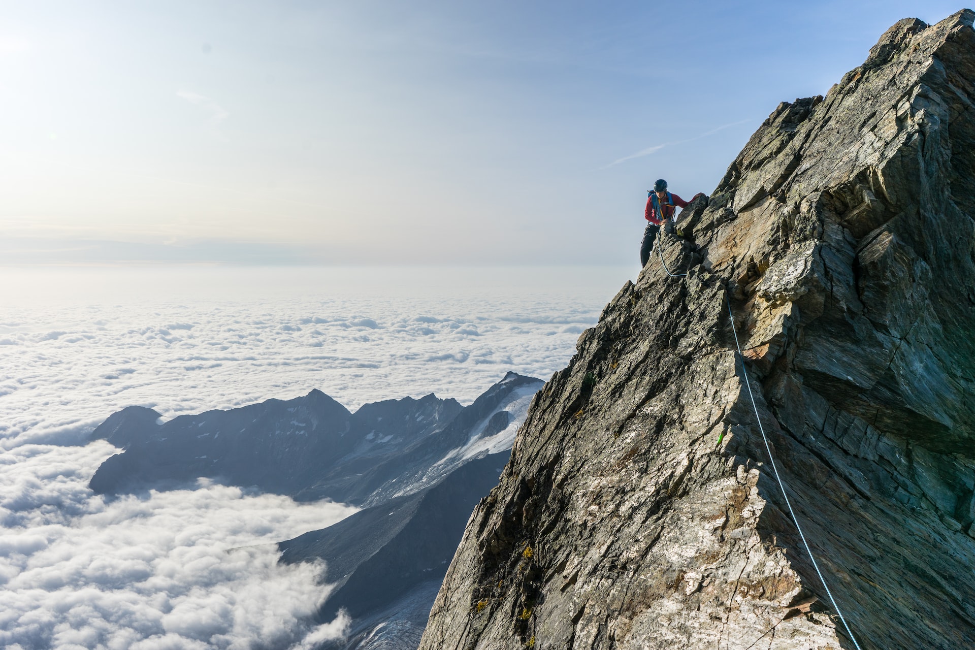 climbing a high mountain