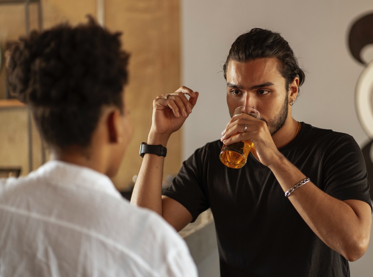 a person having a drink at a party