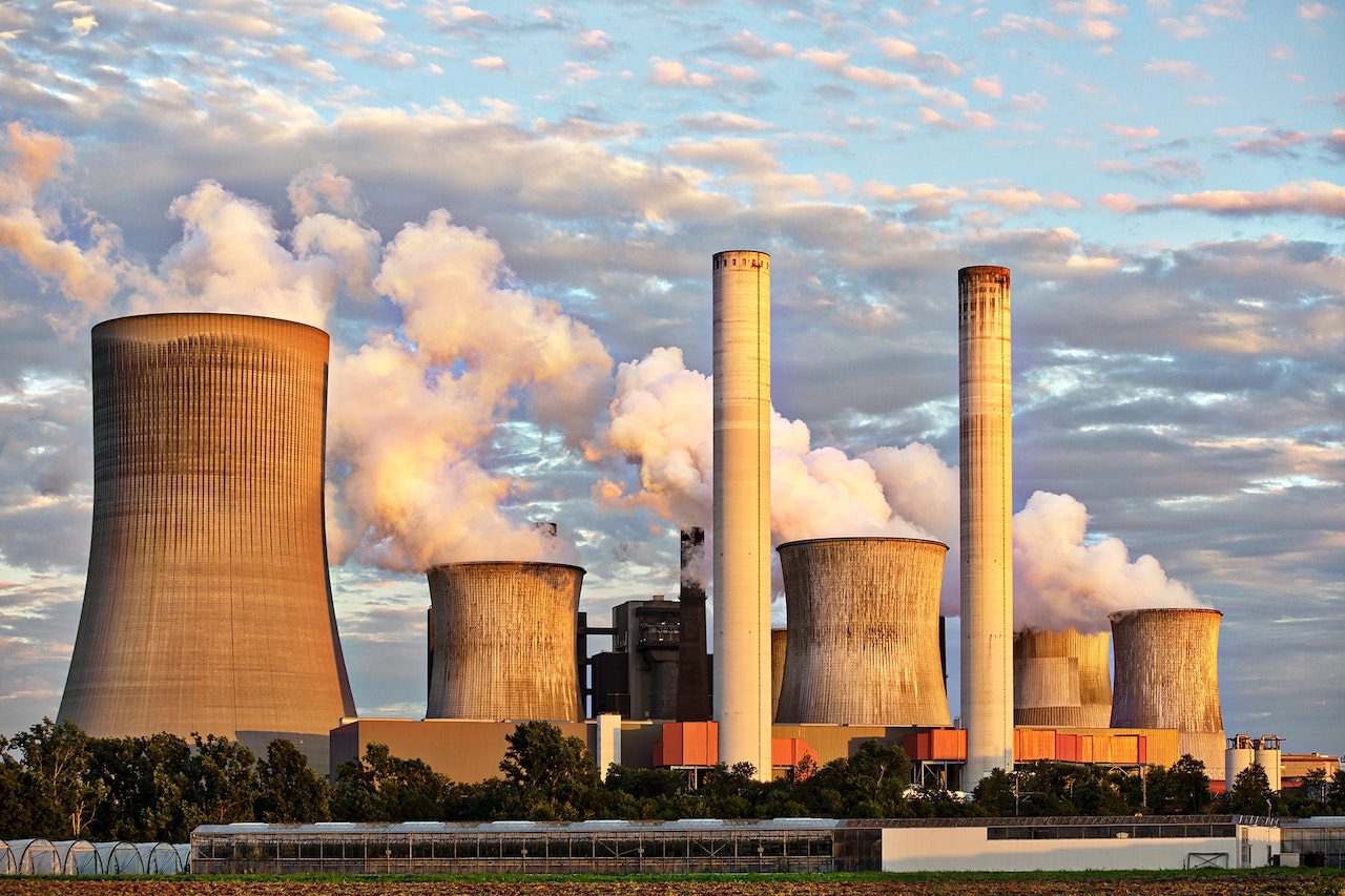 power plants with smoke coming out of them