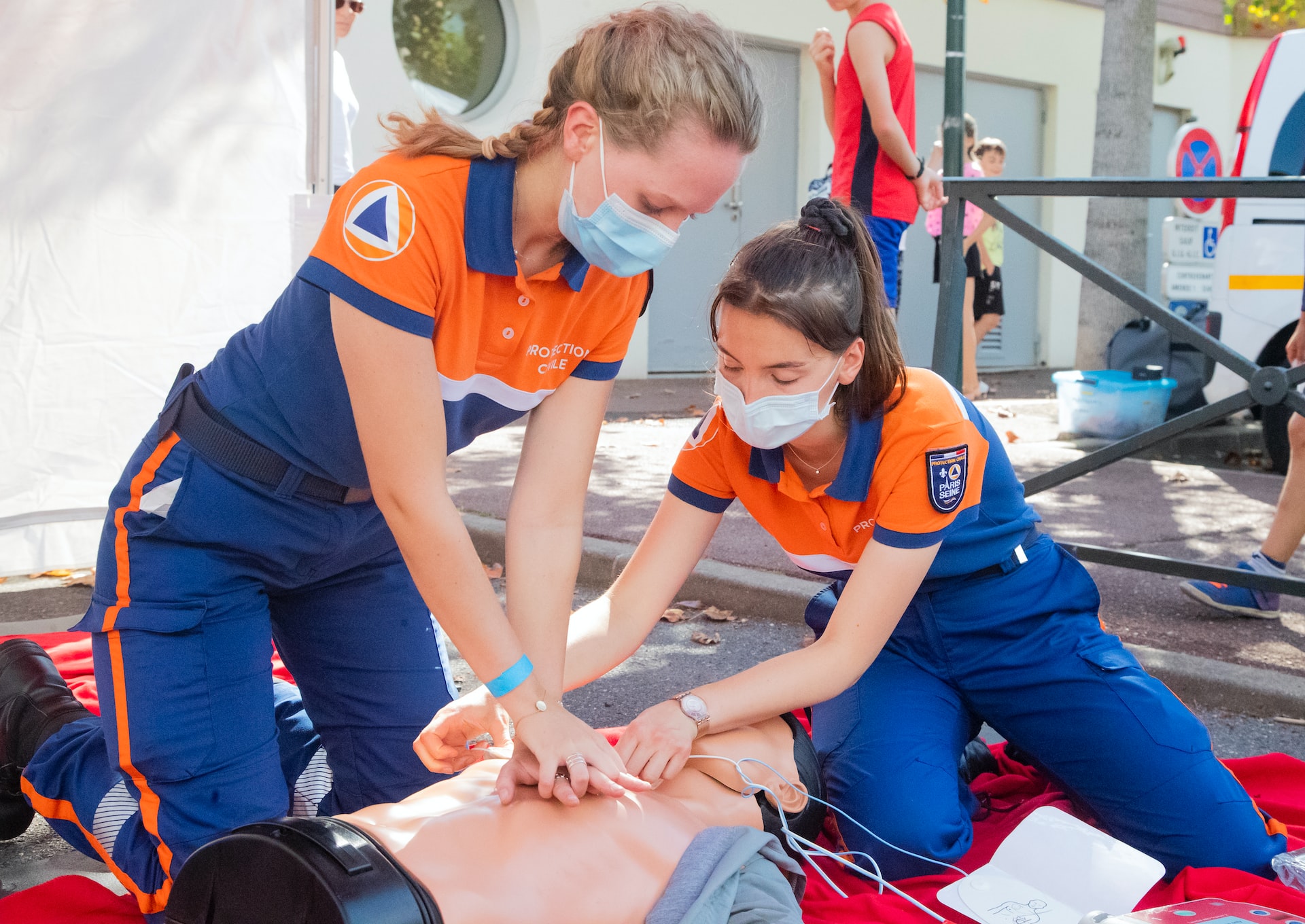 two people practicing cpr