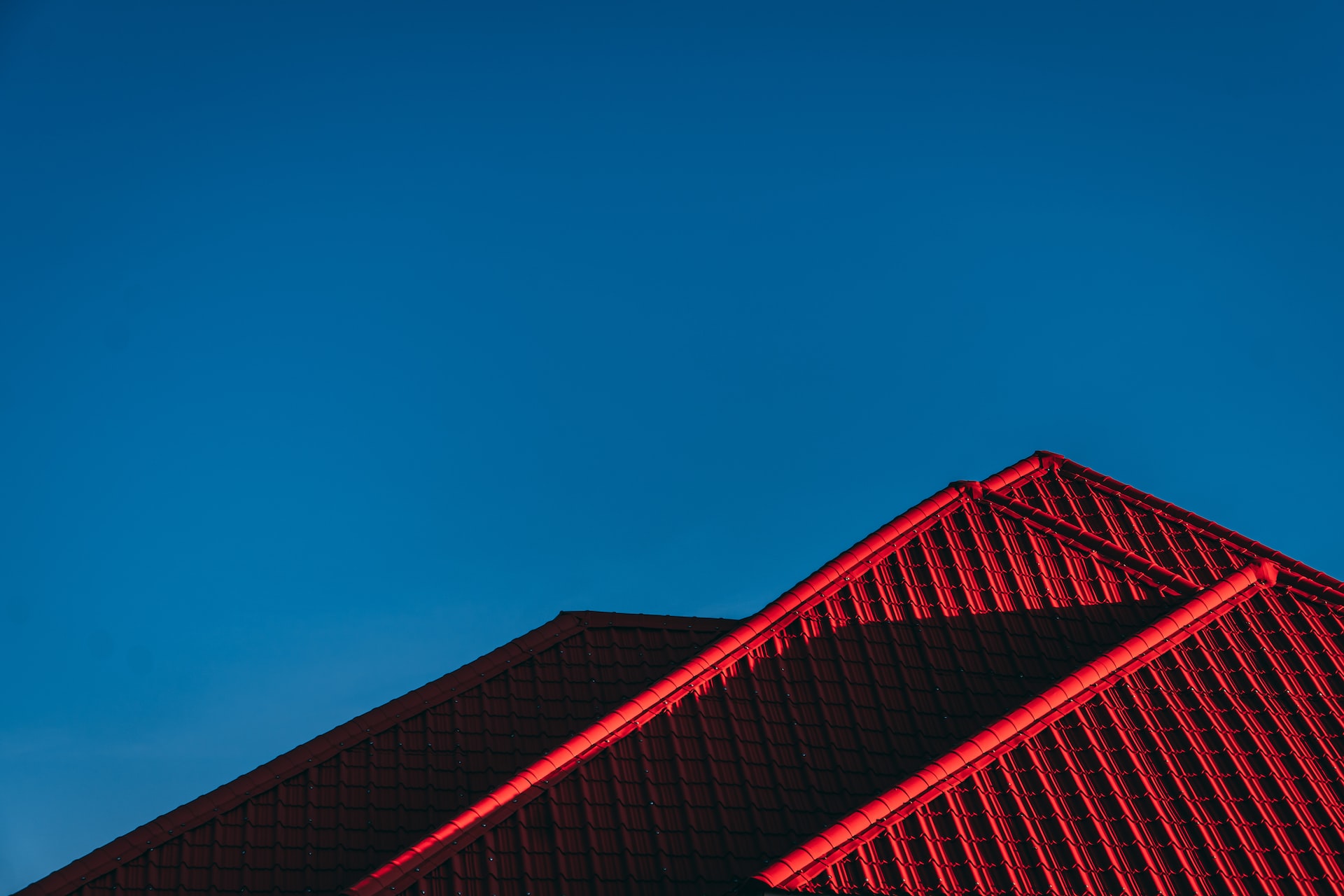 red tiles on a triangle shaped roof