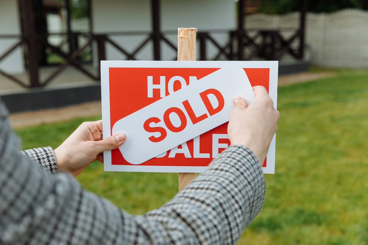 sold sign in front of a home