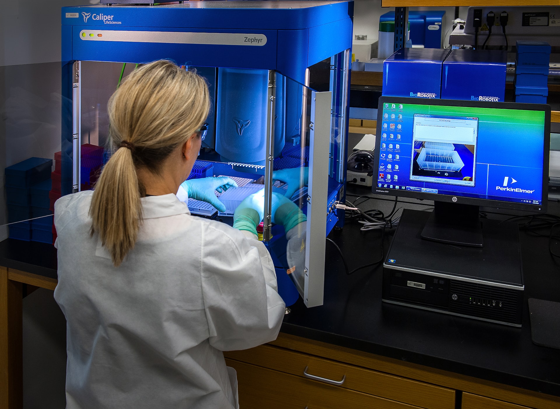 person in front of a monitor running tests in a hospital