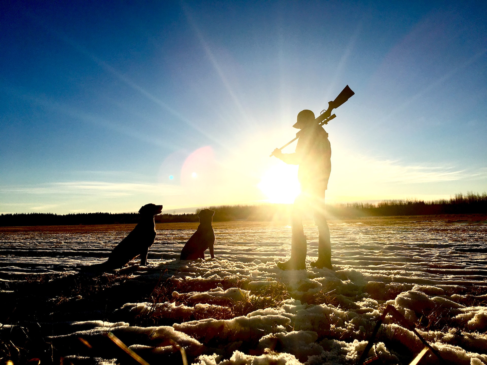 out on a beach with an airgun