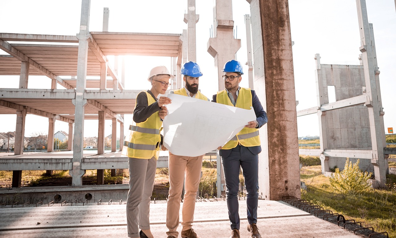 a team looking at a design plan for a building