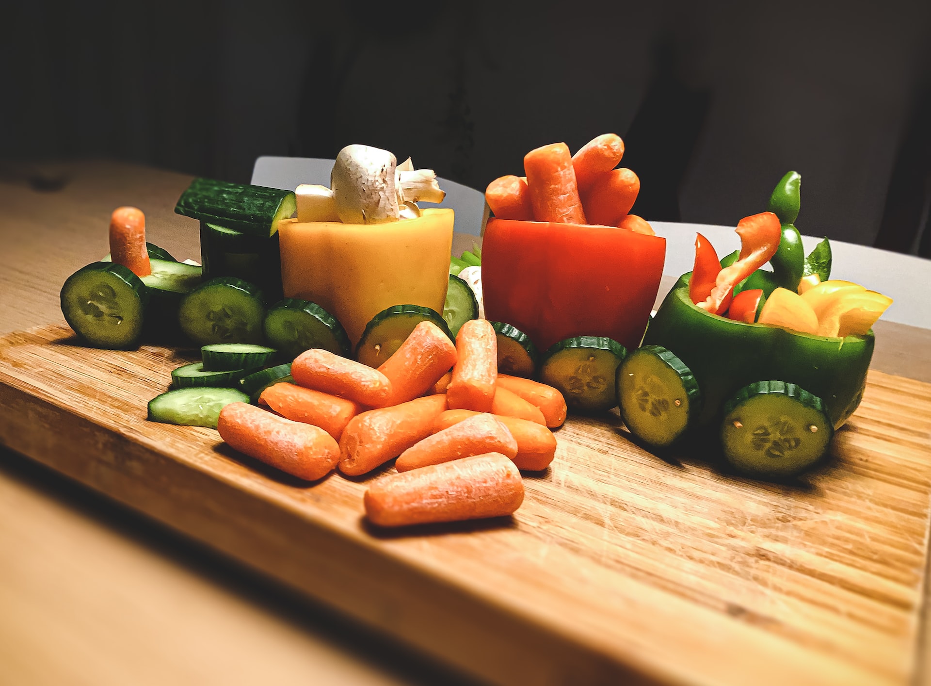 cut veggies on a wooden butchers board