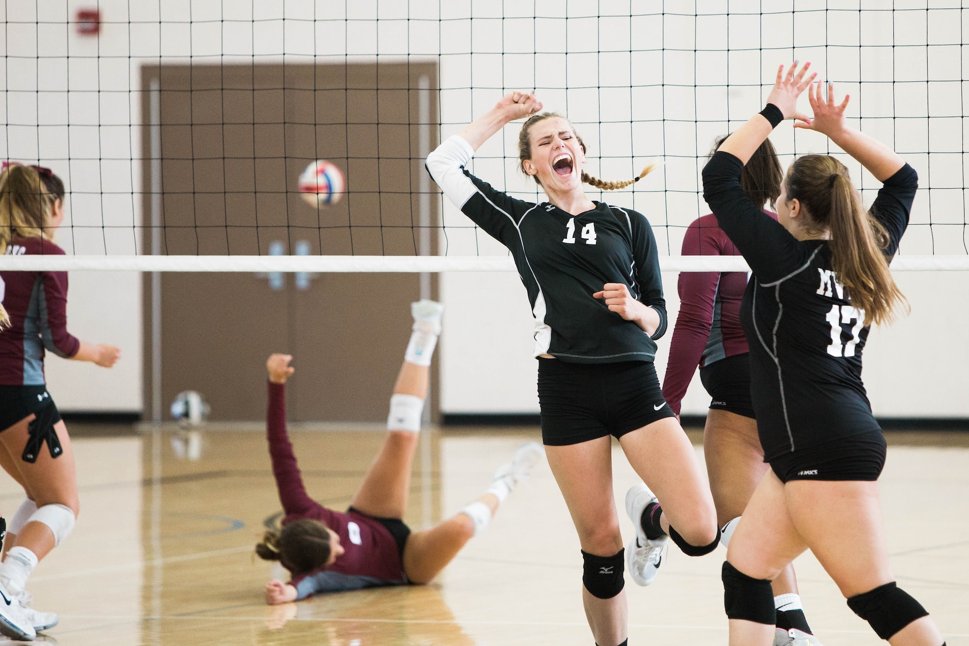 people getting a point in volleyball