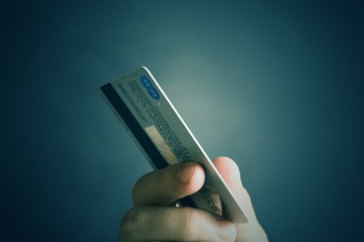 hand holding a credit card, credit card processing.com